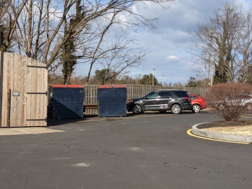 picture of a Business dumpster on a sunny day