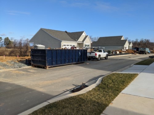 Construction dumpster on construction site